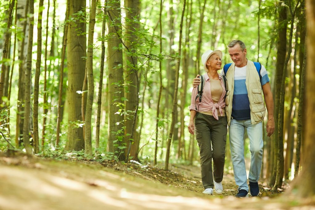 Senior couple walking in nature